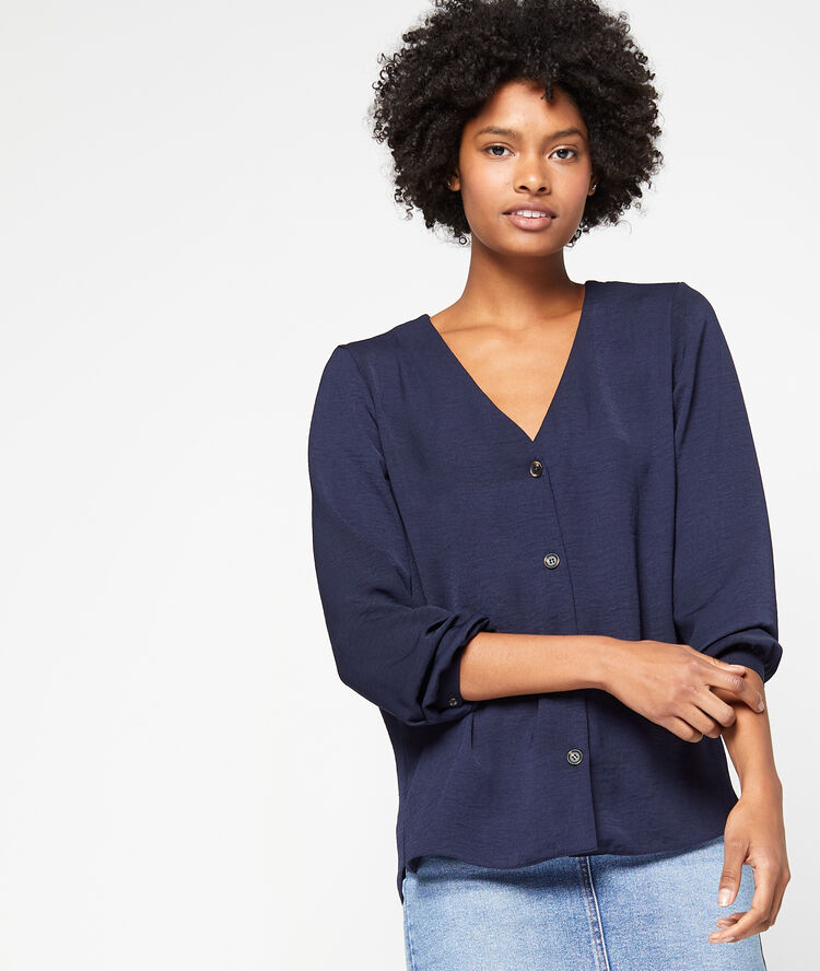 Blusa abotonada cuello en v azul marino.