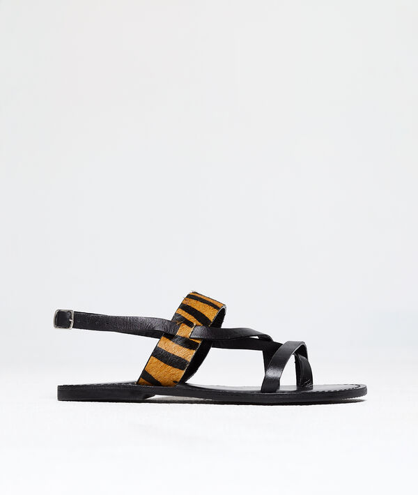 Sandalias planas con animal print Sandalias planas con animal print