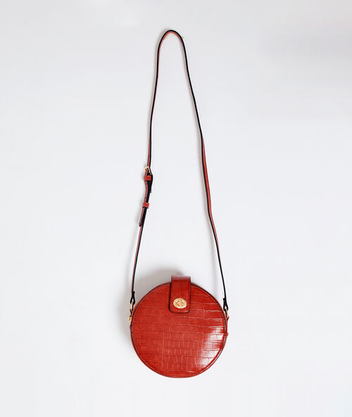 Bolso redondo efecto cocodrilo rojo.