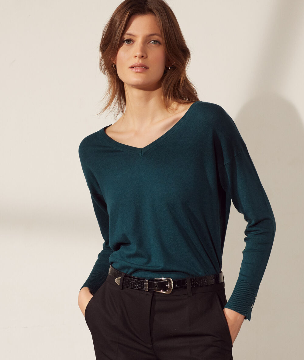 Jersey de punto fino verde pavo.