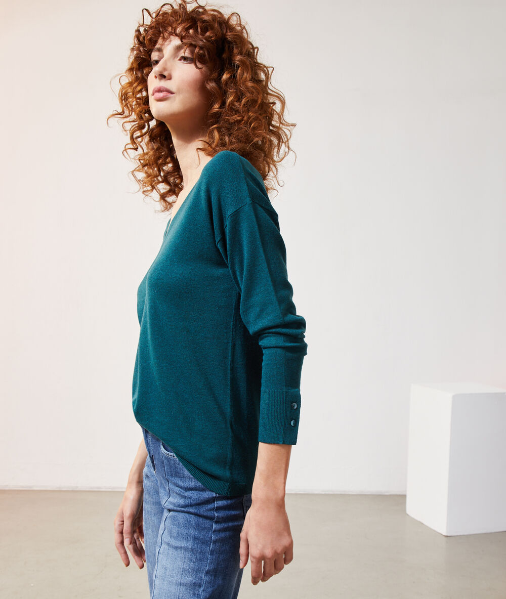 Jersey de punto fino verde pavo.
