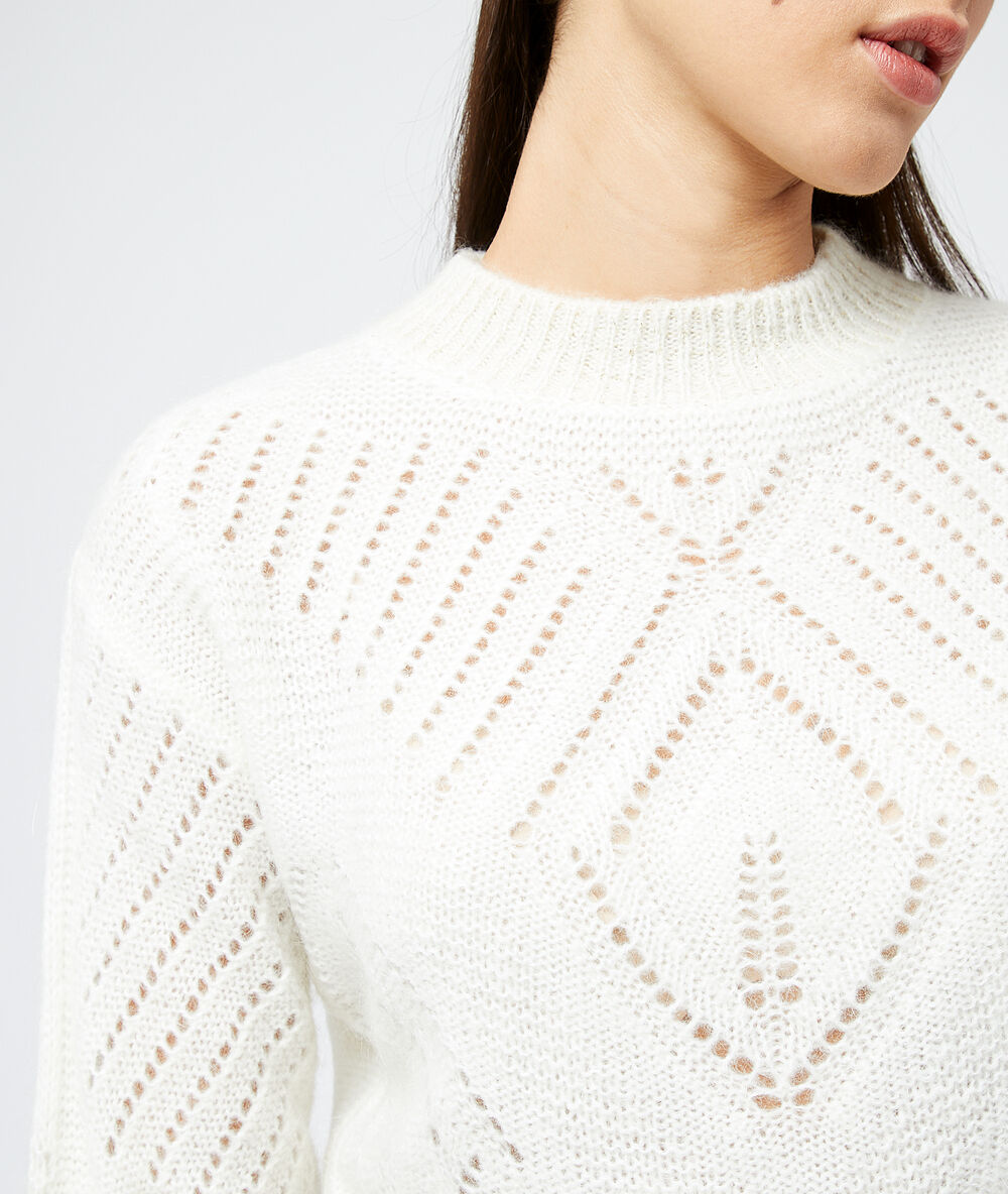 Jersey de punto calado crudo.