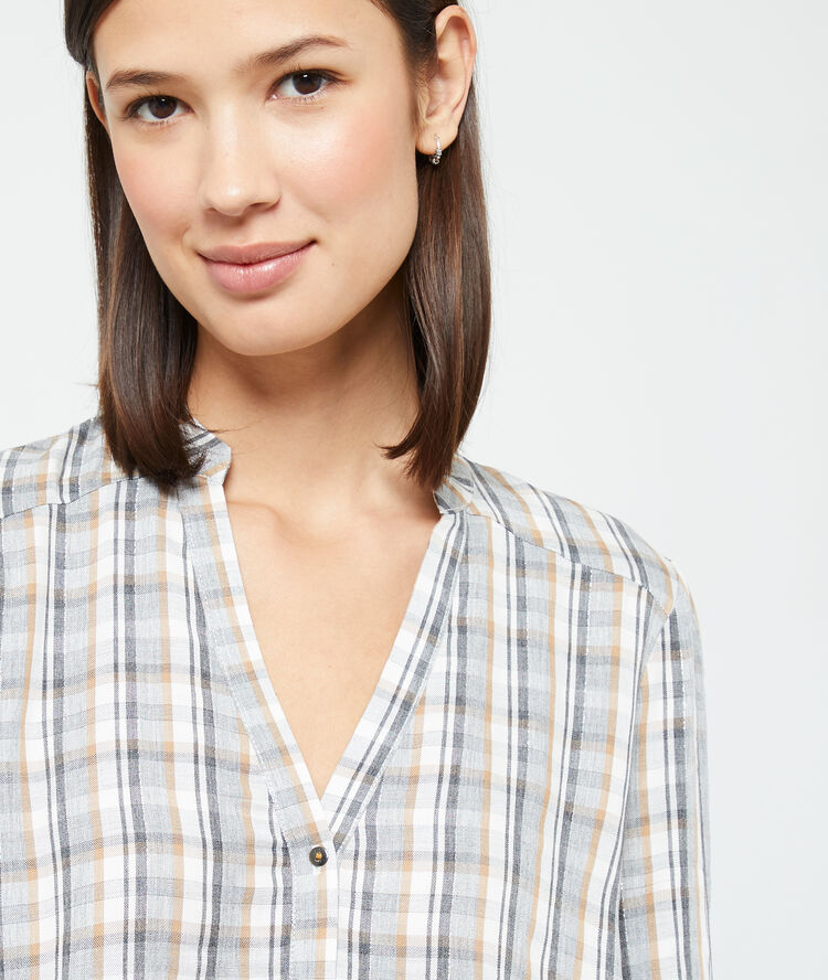 Blusa a cuadros crudo.