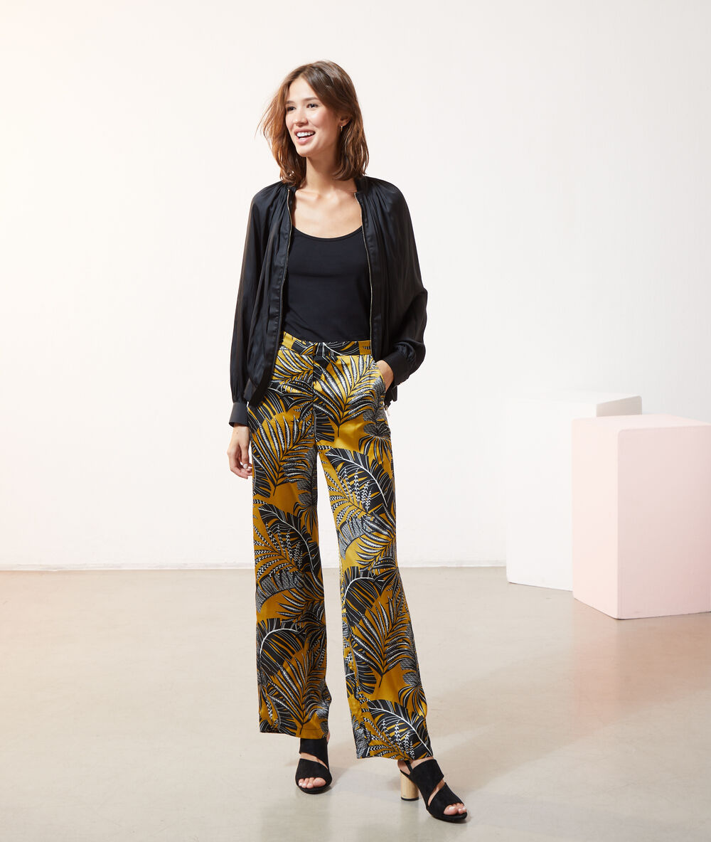 Pantalón estampado hojas oliva.