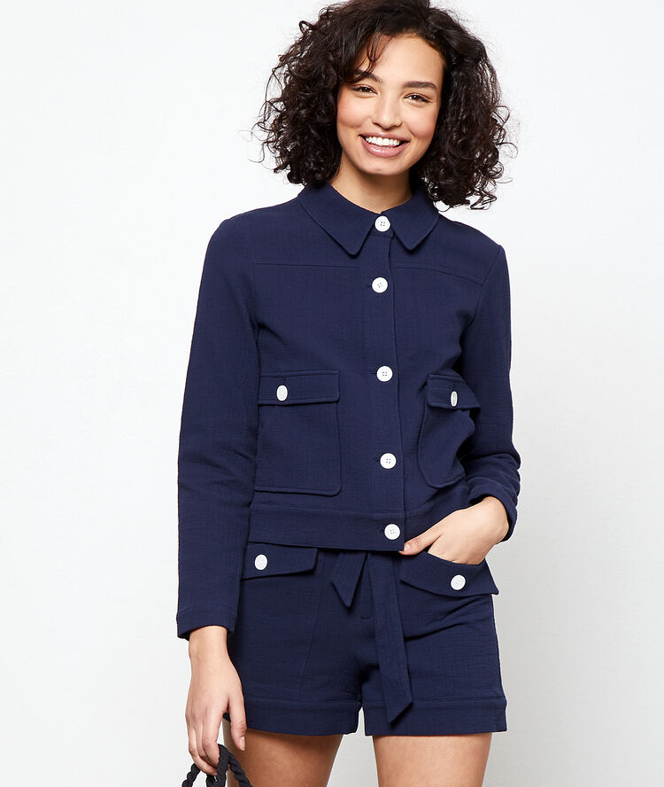 Chaqueta de sastre lisa de algodón azul marino.