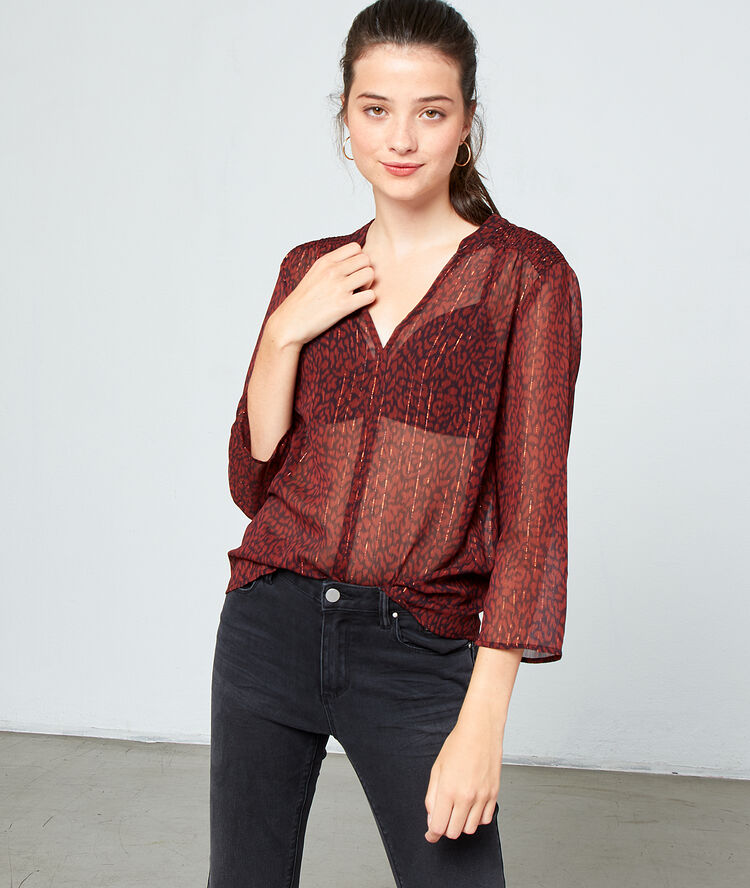 Blusa efecto transparente rojo.
