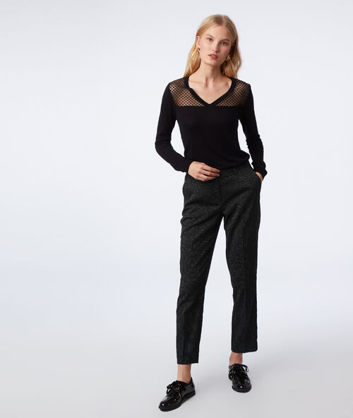Pantalón cigarette motivos jacquard negro.