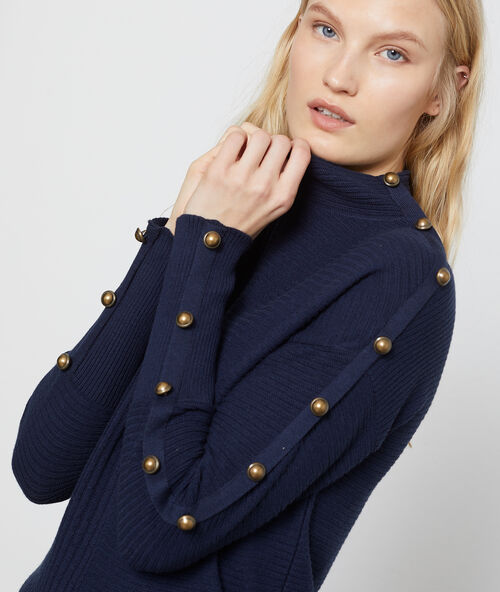 Jersey acanalado de cuello enrollado azul marino.