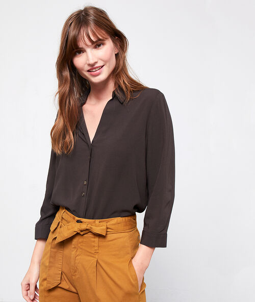 Camisa con botones efecto ámbar bronce.