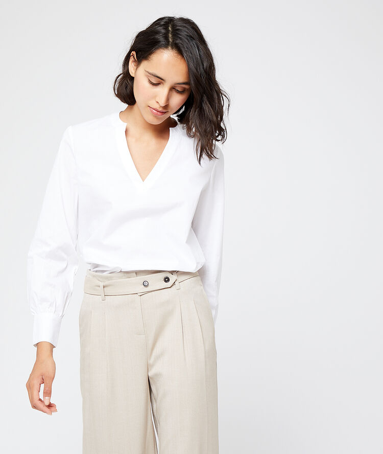 Camisa de algodón blanco.