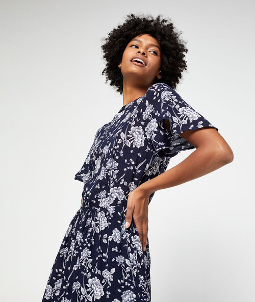 Vestido largo espalda abierta estampado floral azul marino.