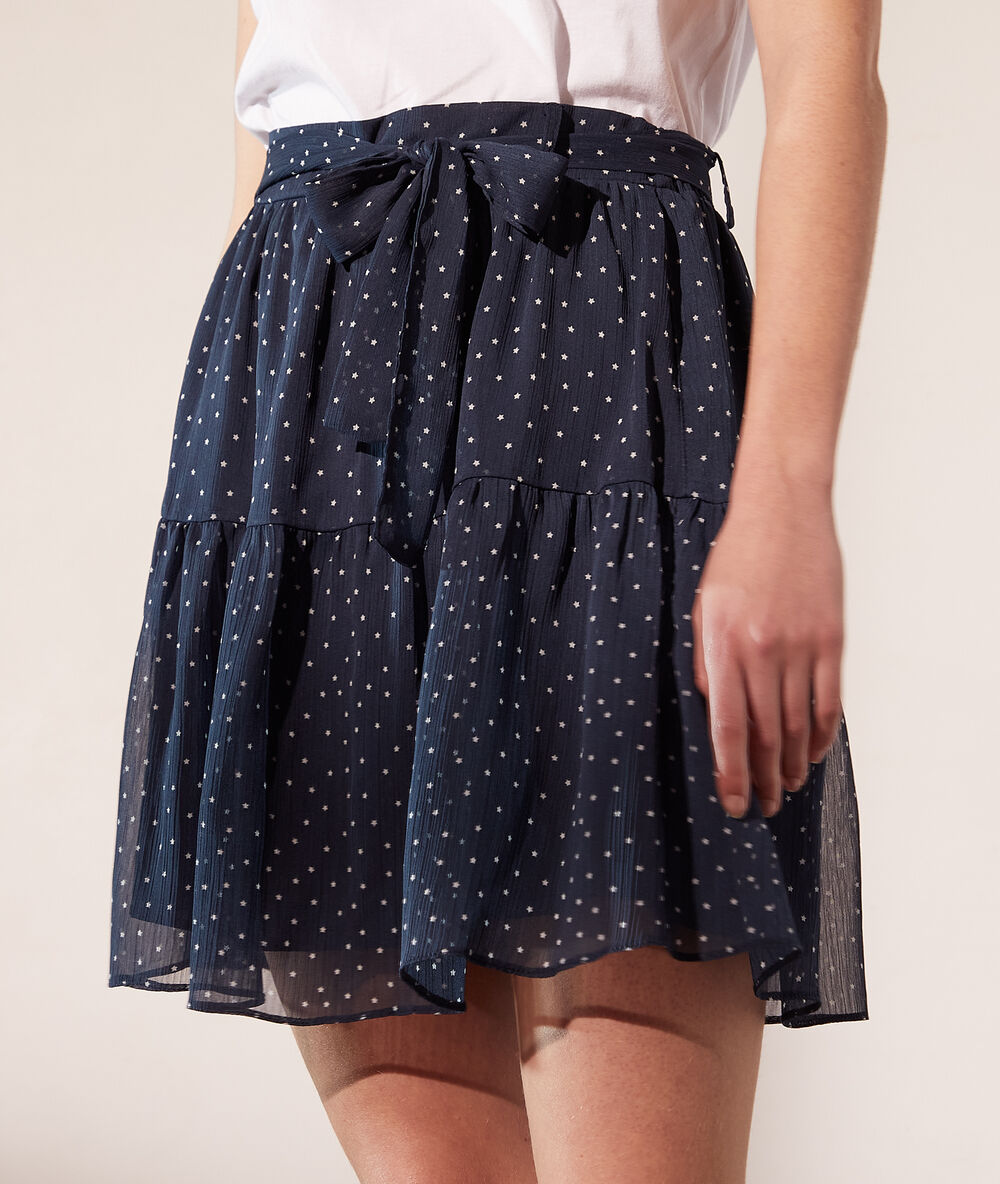 Falda estampado estrellas azul marino.