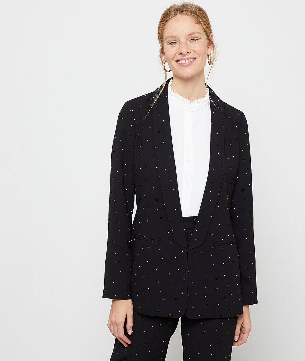 Chaqueta de sastre de lunares negro.