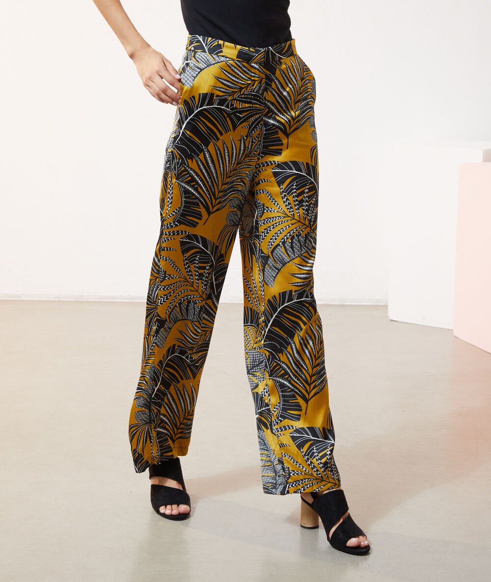 Pantalón estampado hojas oliva.
