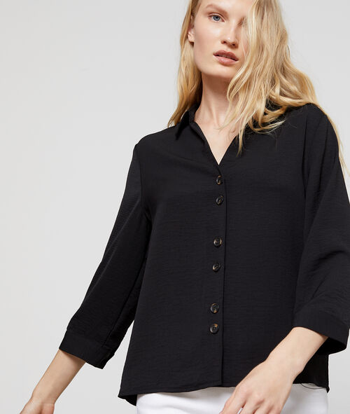Blusa con cuello camisa y botones Blusa con cuello camisa y botones