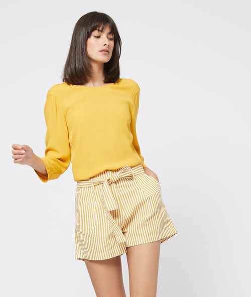Blusa espalda escotada con volantes c.curry.