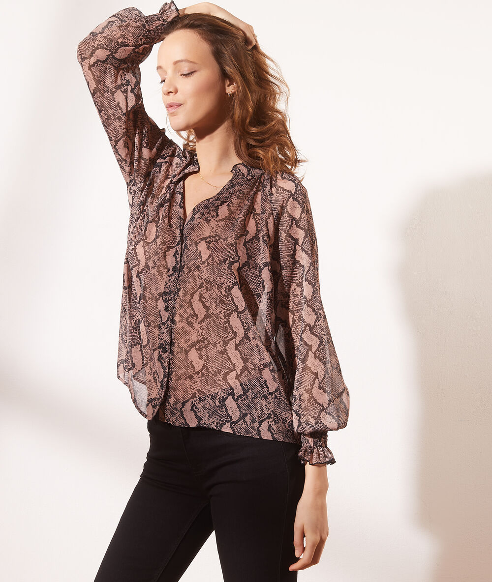 Blusa estampado serpiente maquillaje.