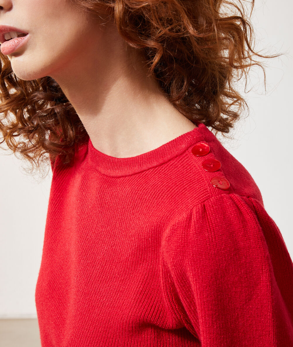 Jersey mangas balón rojo.
