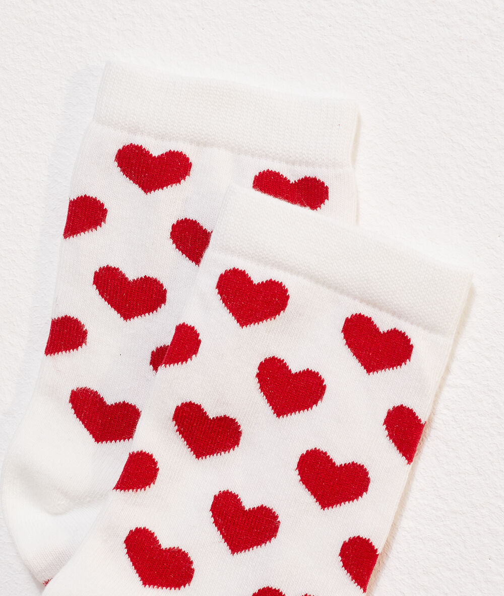 Calcetines corazón blanco.