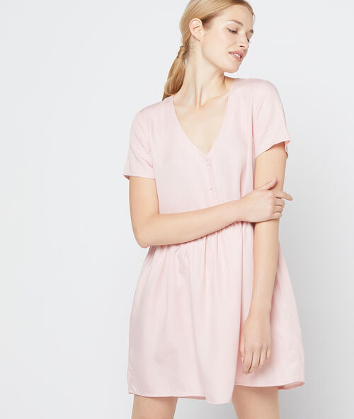 Vestido acampanado de tencel rosa p&aacute;lido.
