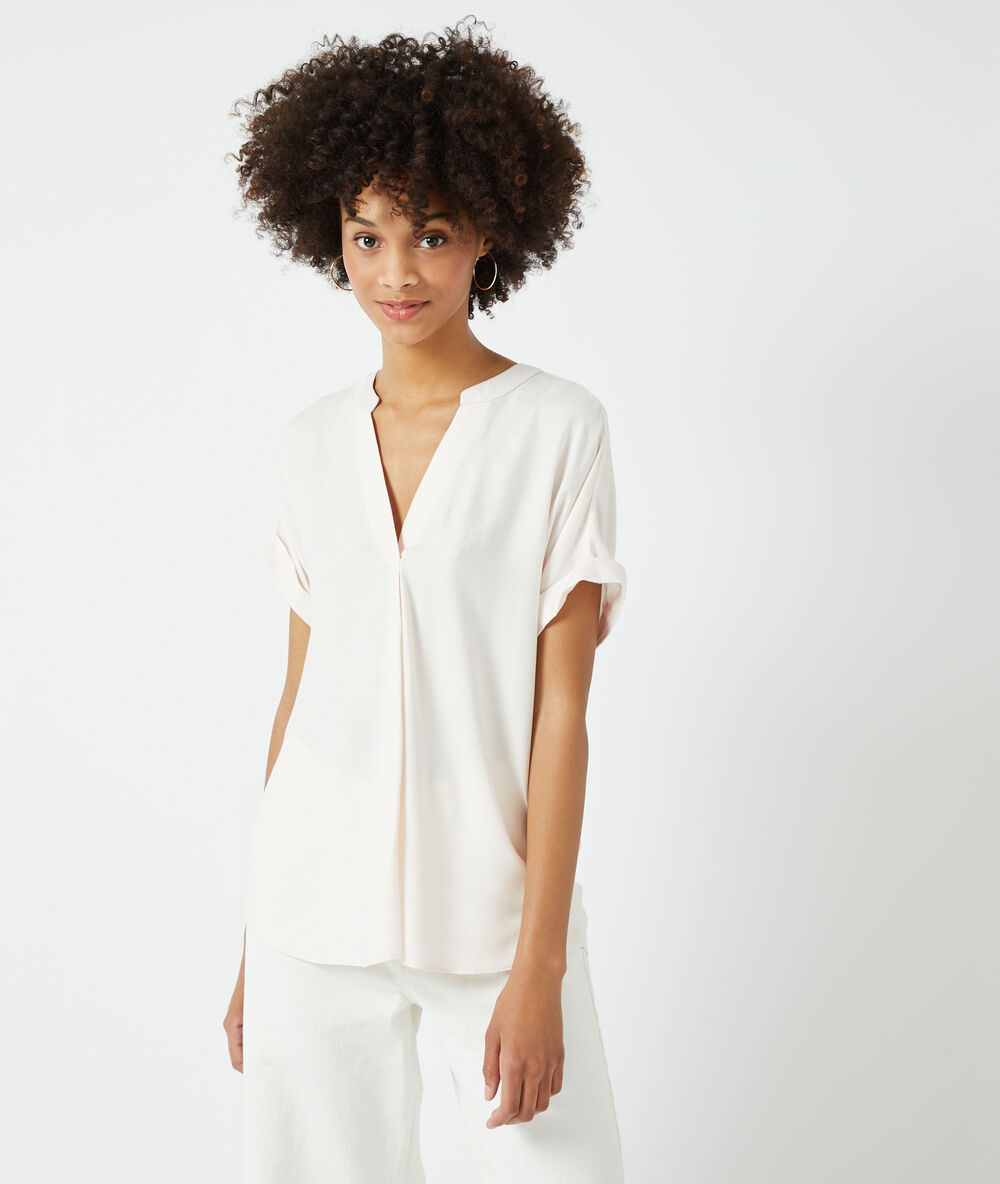 Camisa lisa beige rosado.