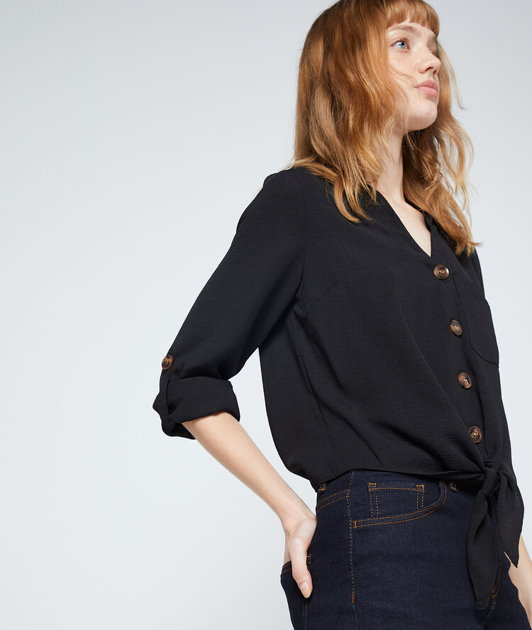 Camisa abotonada negro.