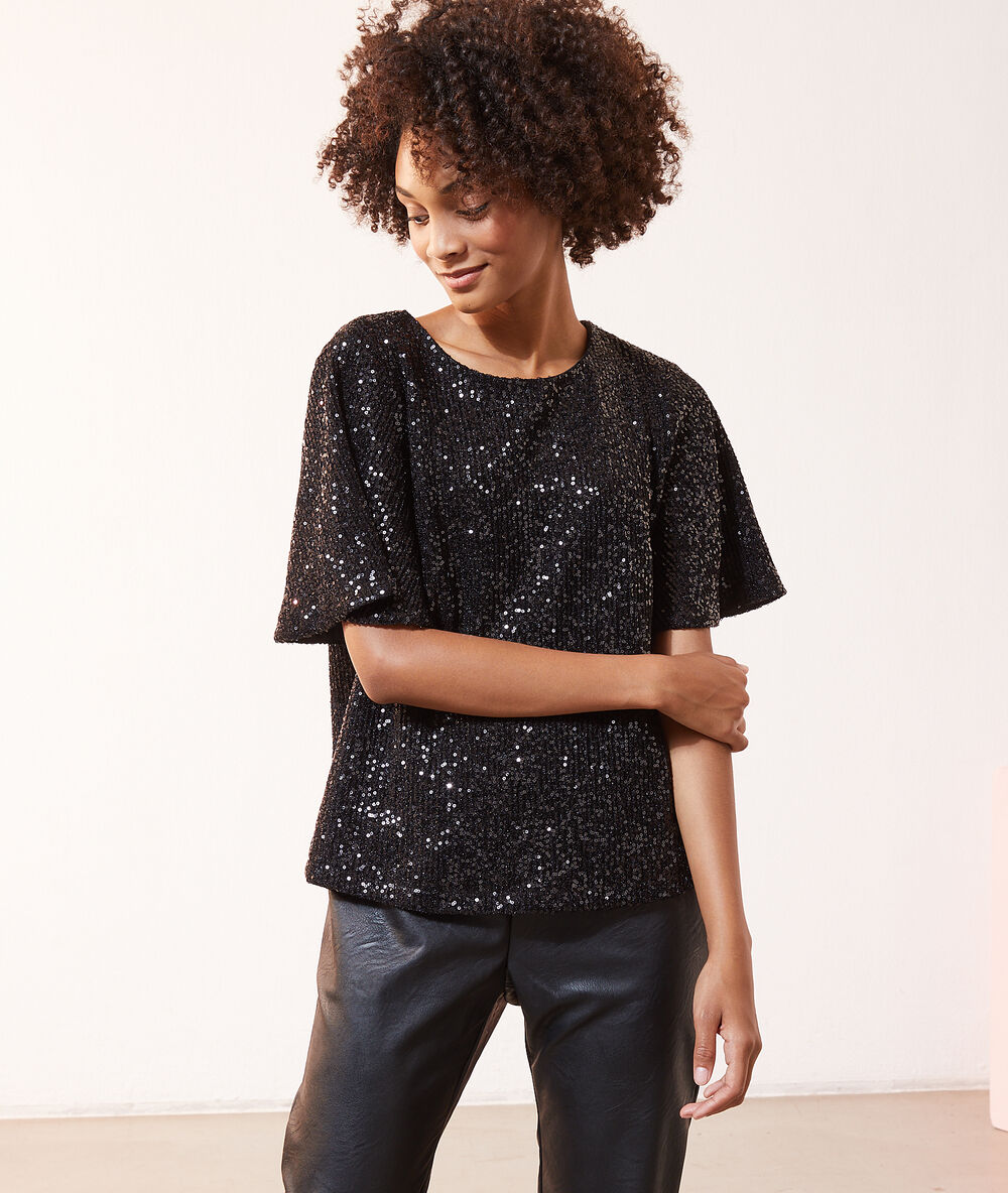 Blouse à sequins, manches volants noir.