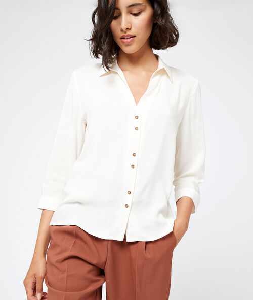 Camisa con botones ambarinos Camisa con botones ambarinos