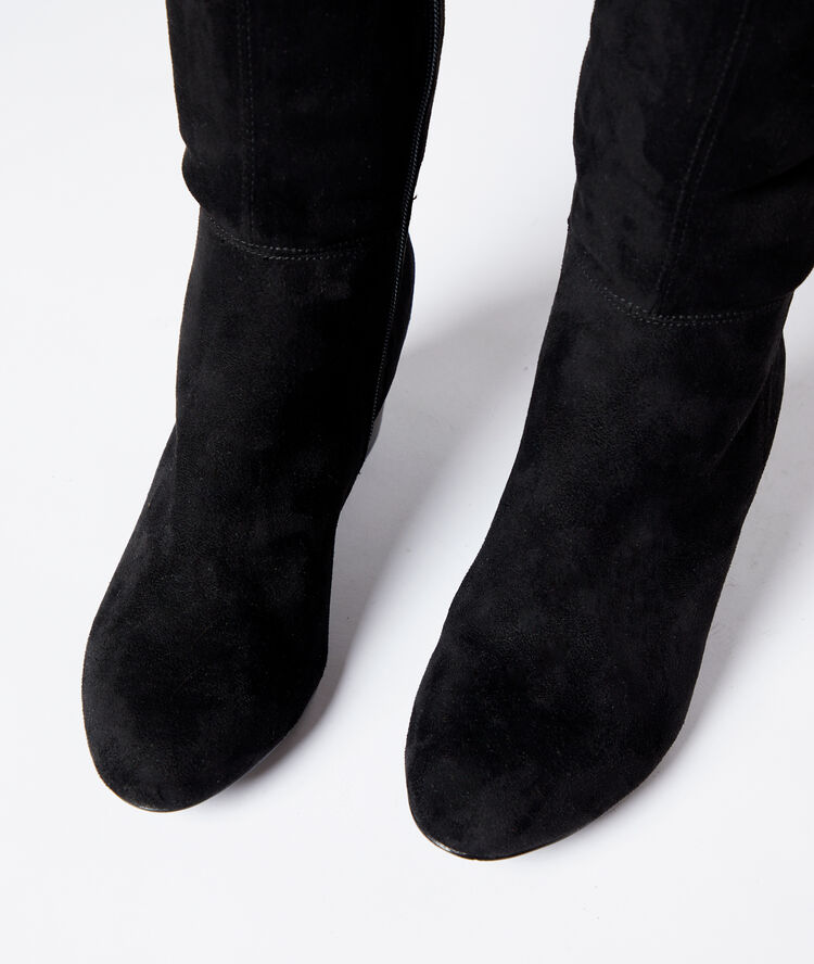 Botas altas de talón efecto ante negro.