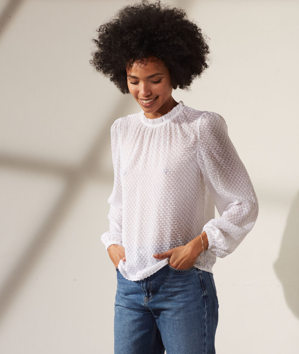 Blusa tul plumeti crudo.