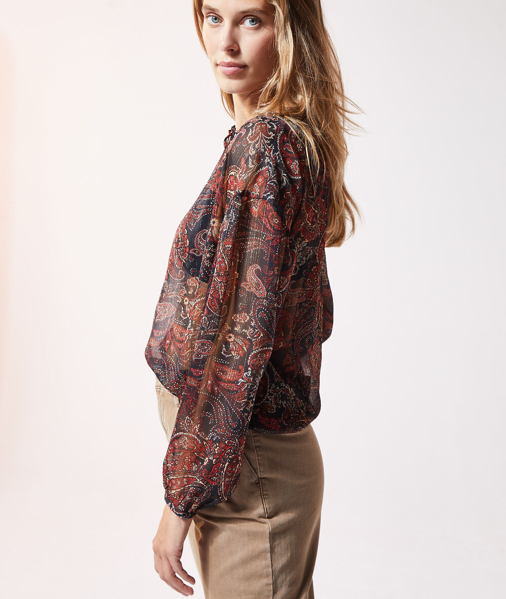 Blouse transparente imprimé cachemire noir.