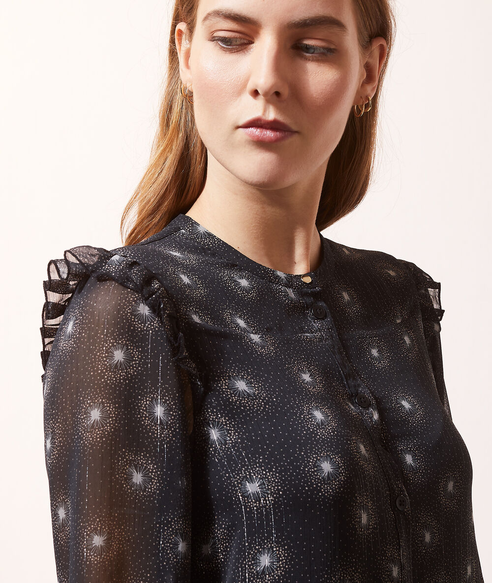 Vestido vaporoso estampado negro.