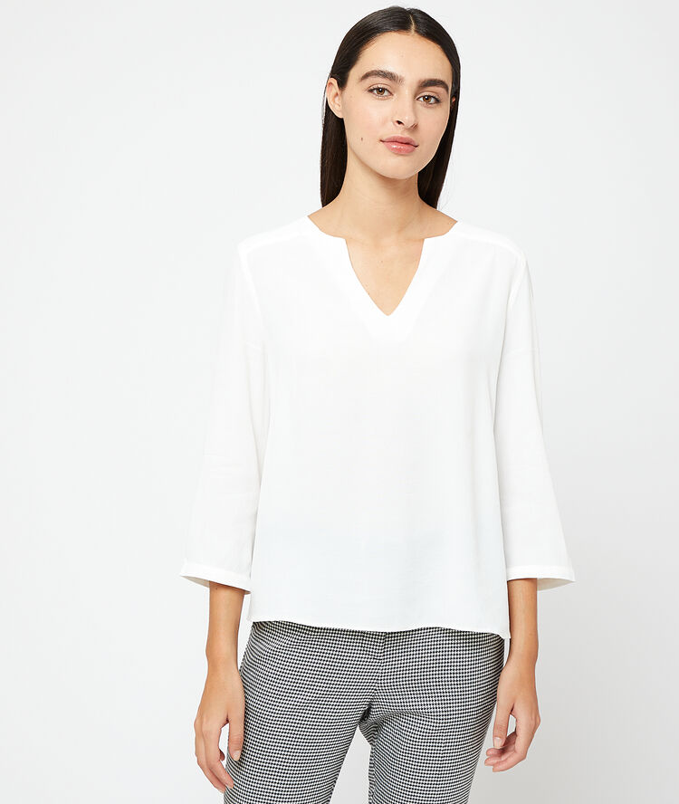 Blusa a rayas crudo.