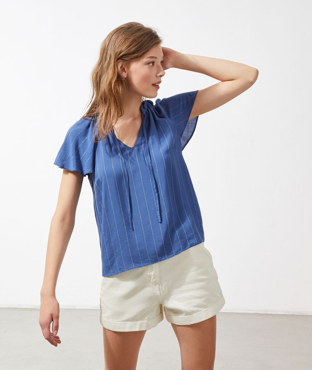 Blusa vaporosa, estampado de rayas azul.