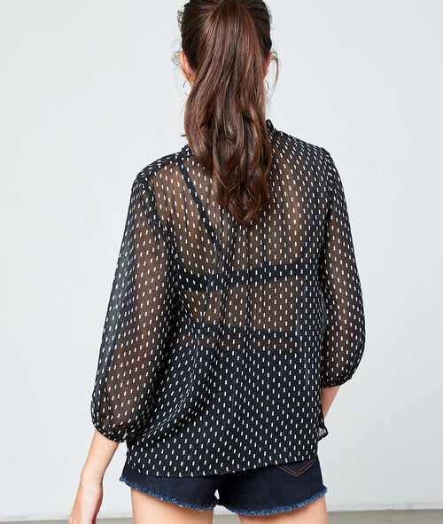 Blusa de lunares transparente