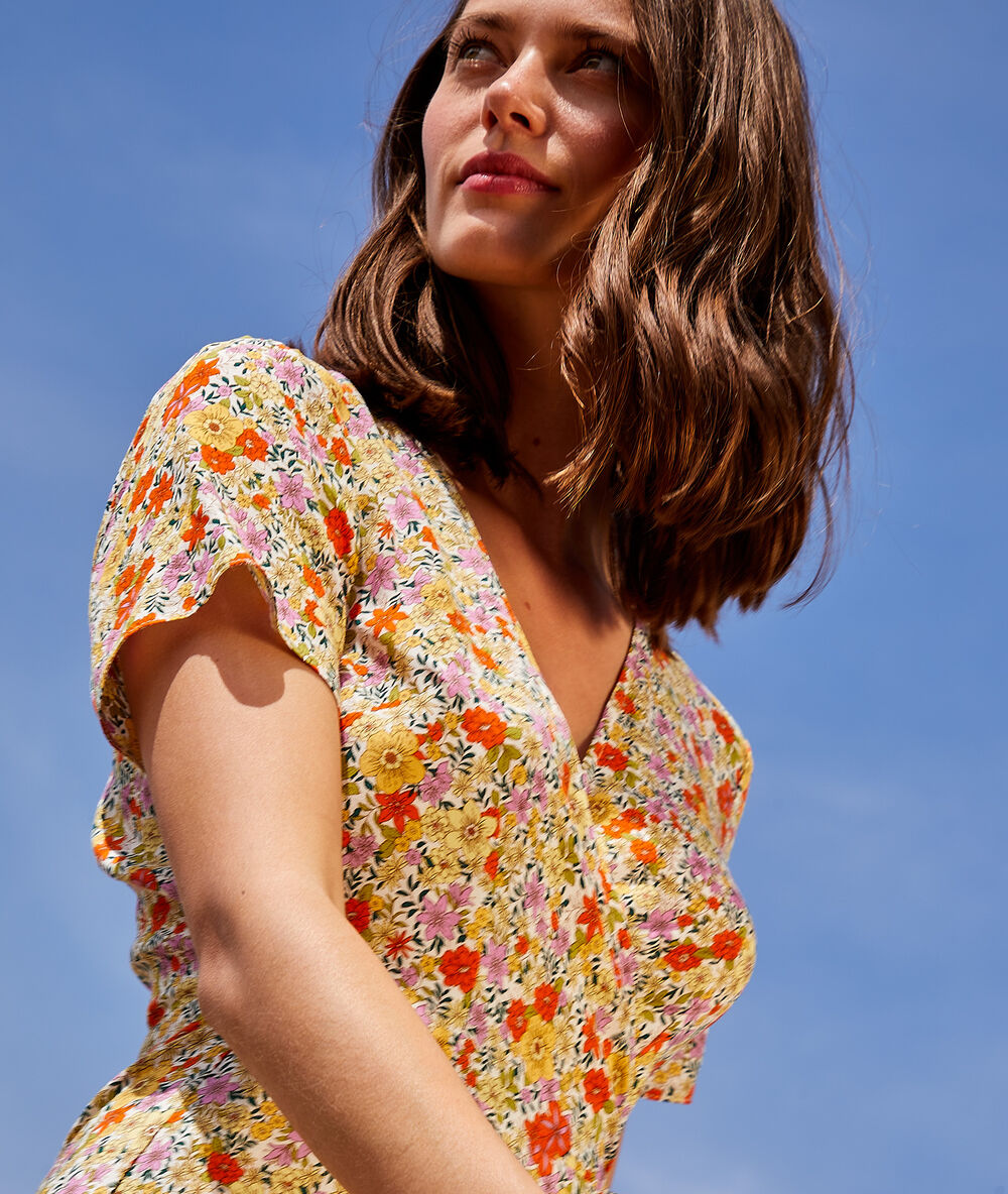 Vestido largo estampado floral crudo.