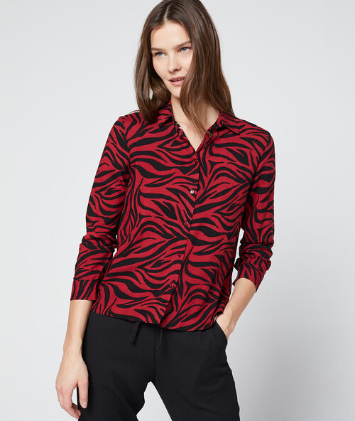 Blusa estampado de cebra granate.