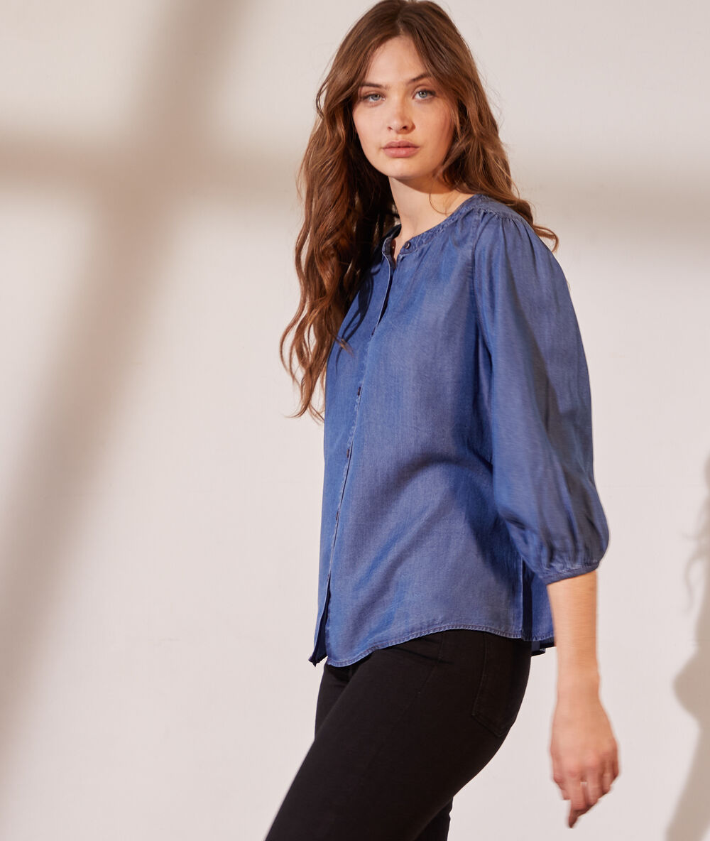 Camisa vaquera, manga abullonada azul.