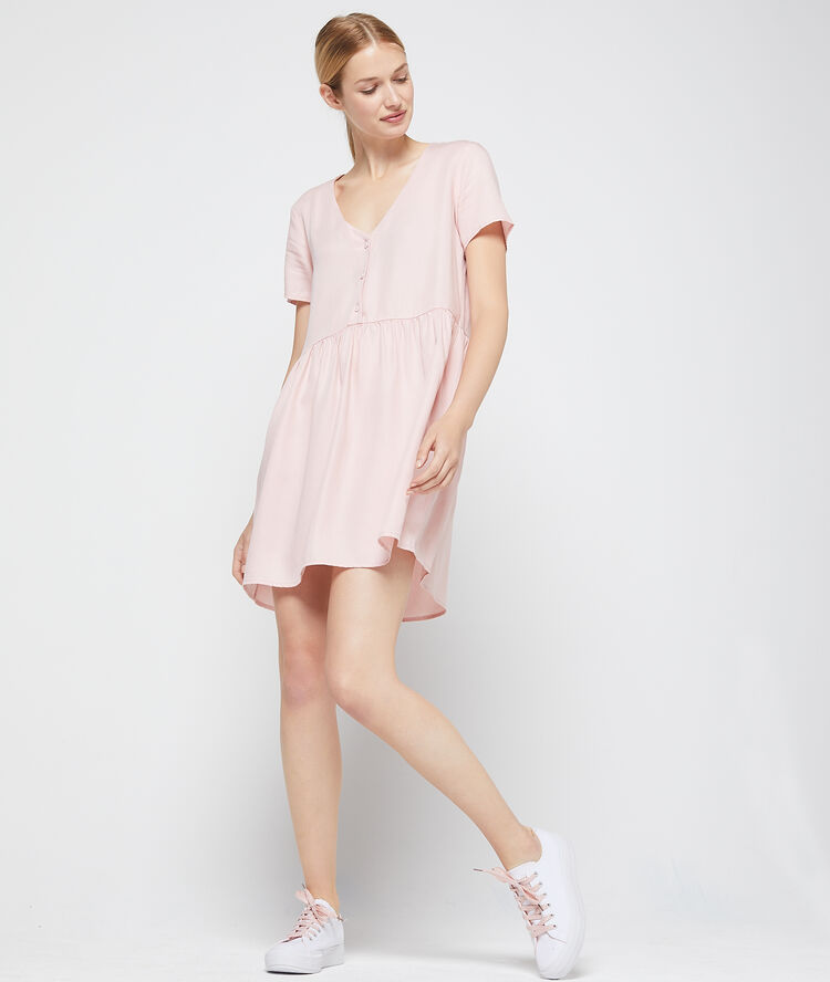 Vestido acampanado de tencel rosa pálido.