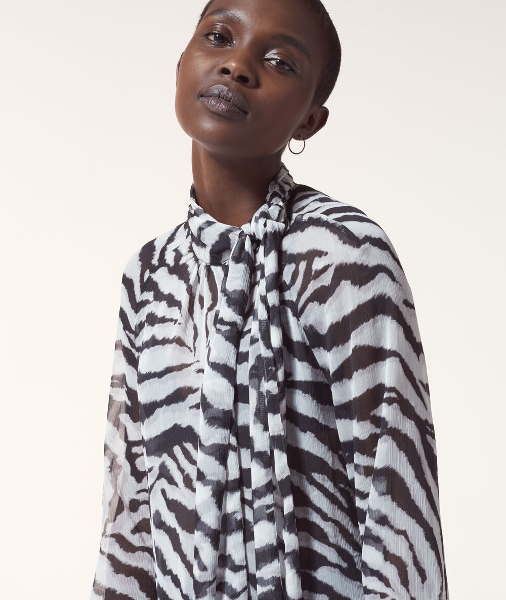 Blouse col lavalière imprimé zébré blanc.
