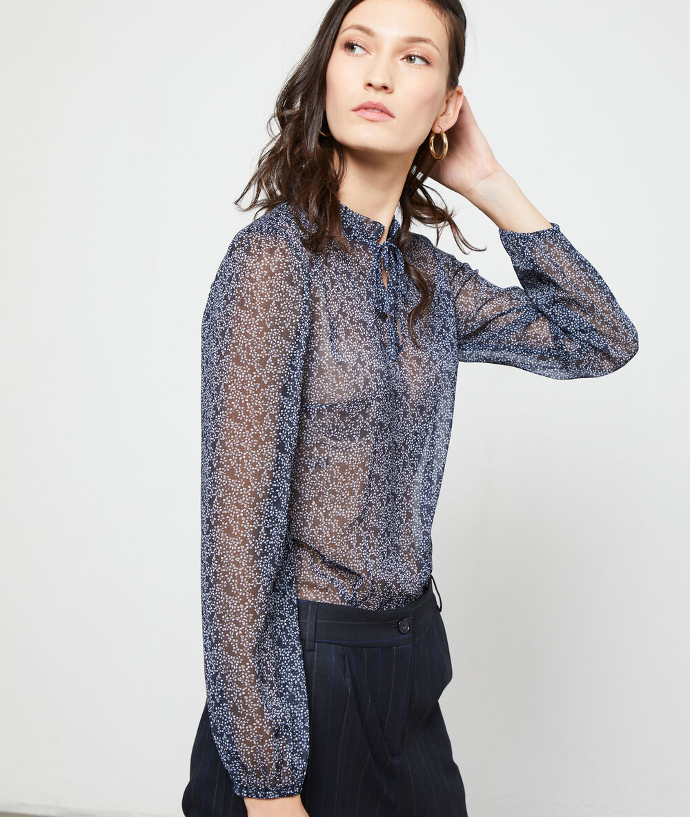 Blusa efecto transparente azul marino.