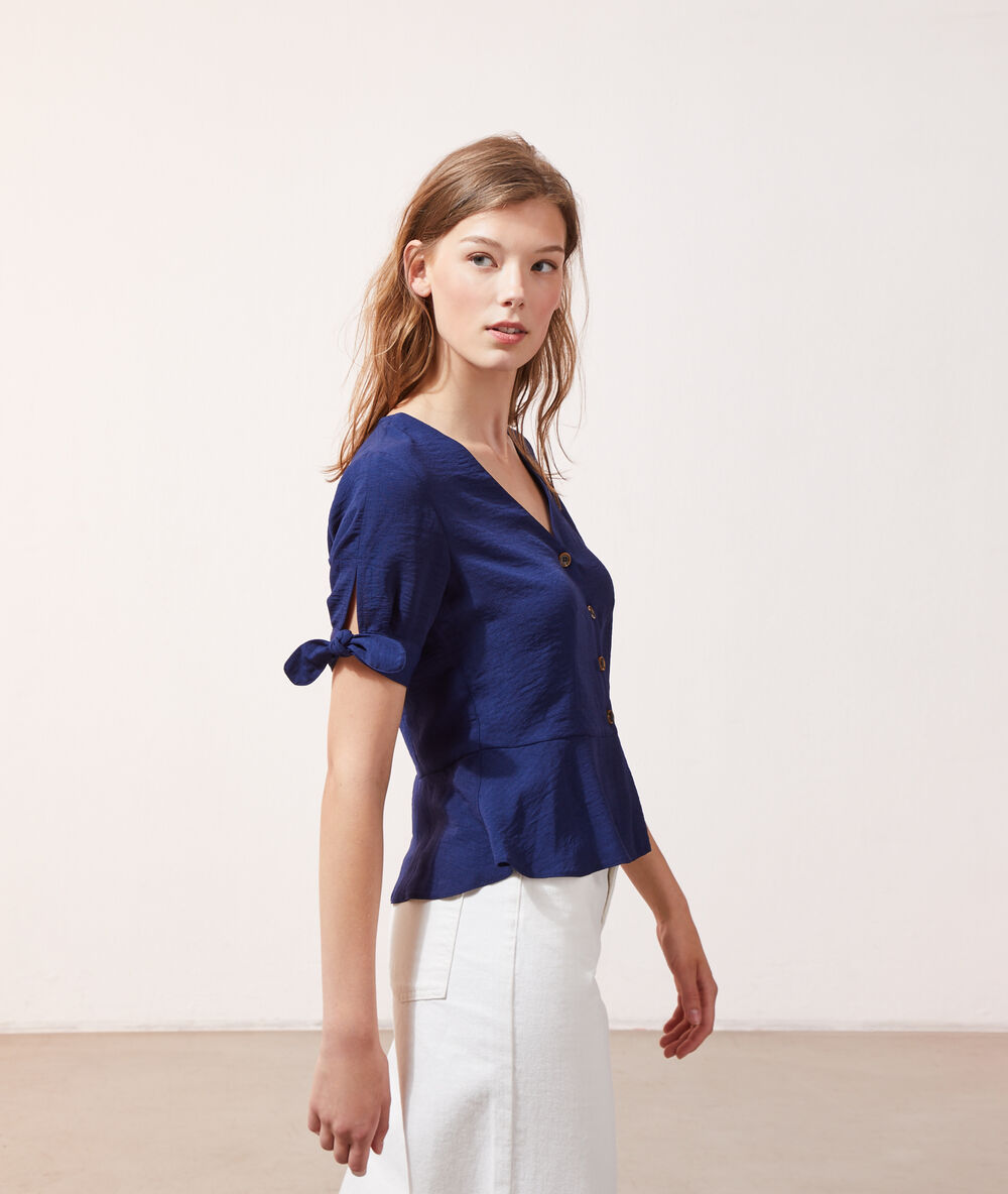 Blusa detalle lazos azul marino.