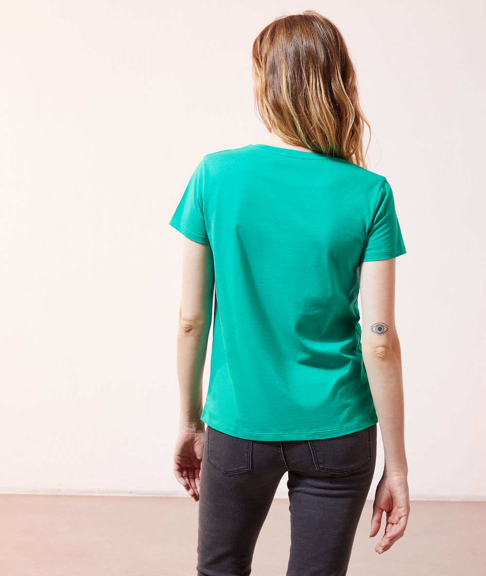 Camiseta 'positive' verde.