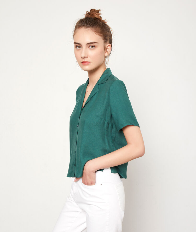 Camisa lisa turquesa.