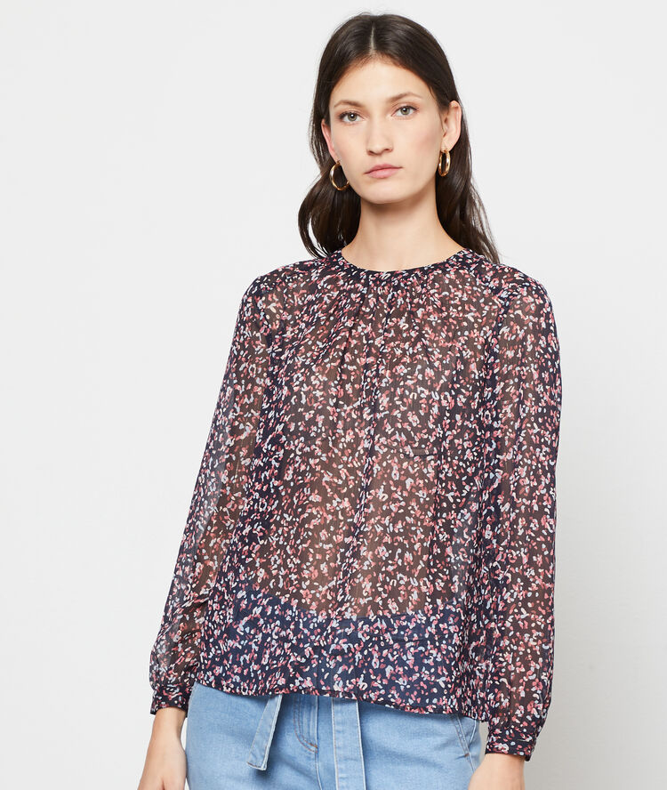 Blusa efecto transparente azul marino.