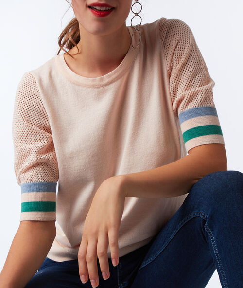 Jersey algodón y tejido rejilla rosa pálido.
