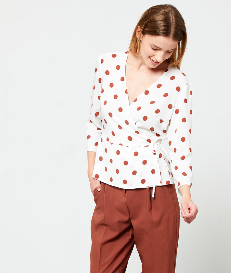 Blusa cruzada de lunares crudo.