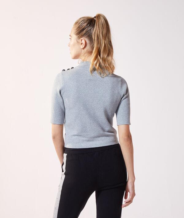 Jersey fino con botones laterales Jersey fino con botones laterales