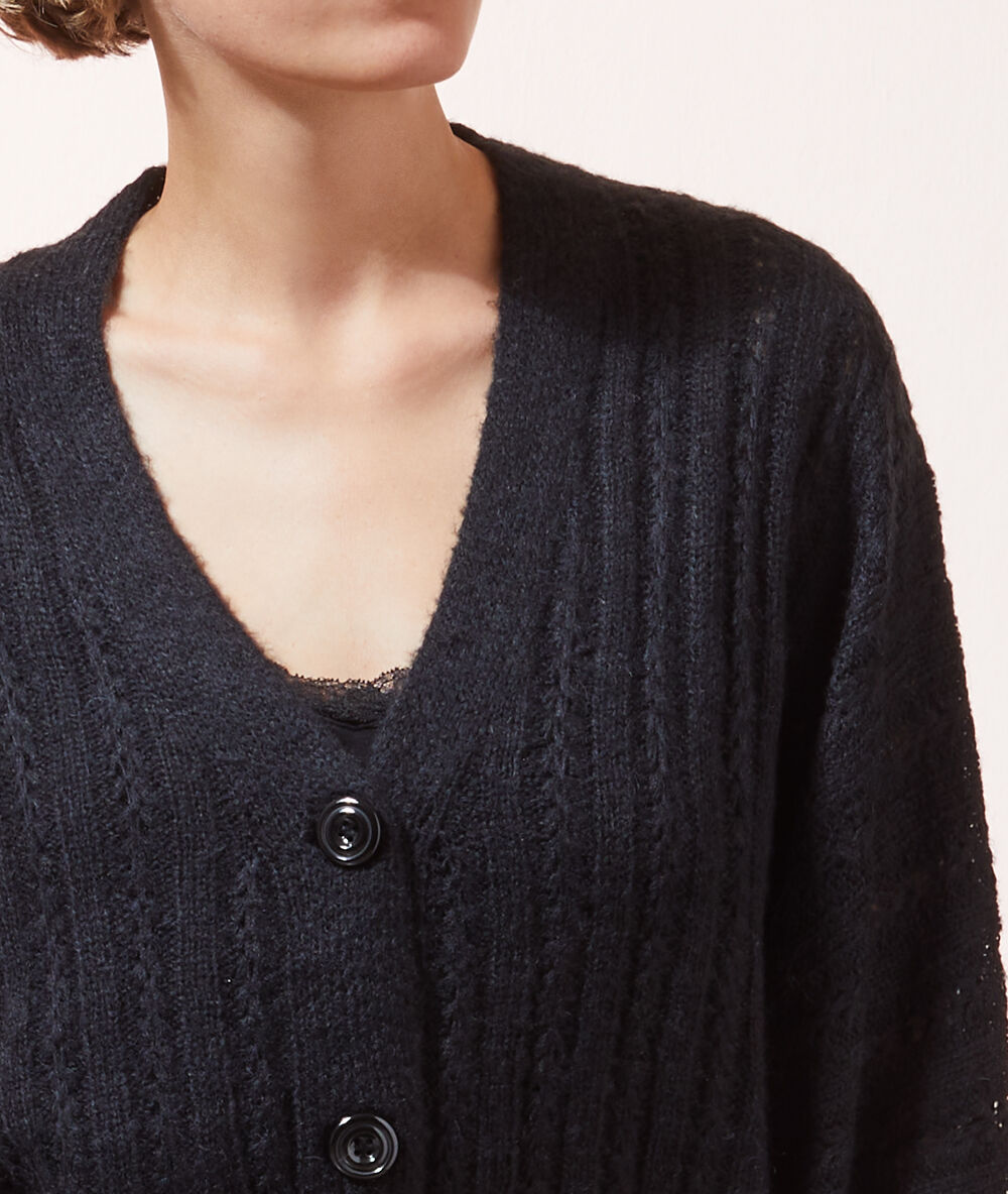 Gilet ample noir.