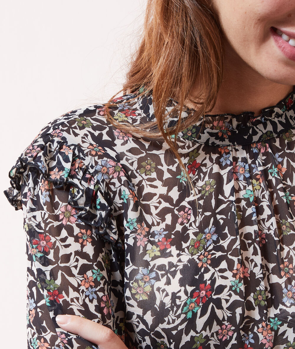 Blusa estampado floral negro.